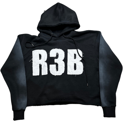 A picture of EXCLUSIVE Black Crop Hoodie with a design that shows 'R3B'