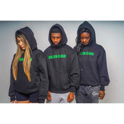 three people wearing black hoodies with a design that shows pictures of green skulls and a R3Birth logo on the back