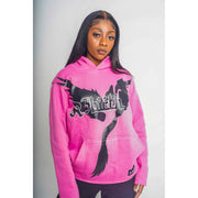 Woman wearing a R3Birth pink signature hoodie with a design that shows "R3Birth logo"