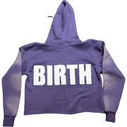 A picture of EXCLUSIVE Lavender Crop Hoodie with a design that shows 'BIRTH' on back